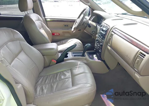 2002 Jeep Grand Cherokee Limited из США, поврежденный, VIN 1J4GX58J22C149574